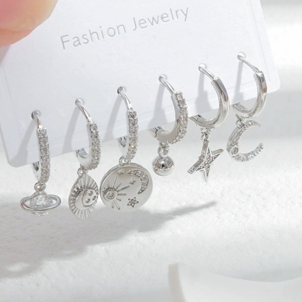 Delicate Zircon-Inlaid Four - Leaf, Star, and Moon Hoop Earrings - three pairs
